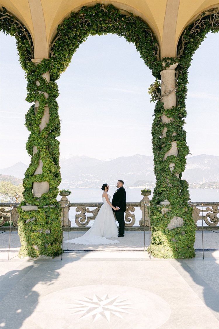 The arches of the Loggia Durini, with a couple at the balustrade