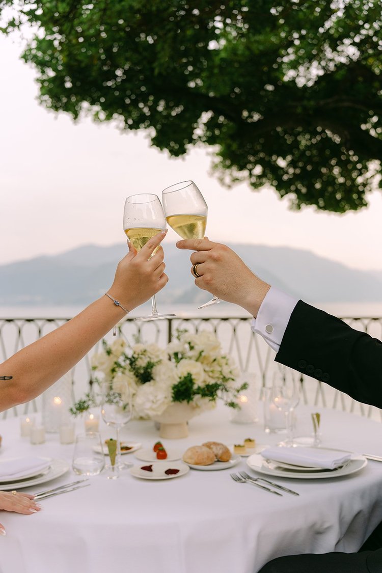 A toast at the table in the gardens