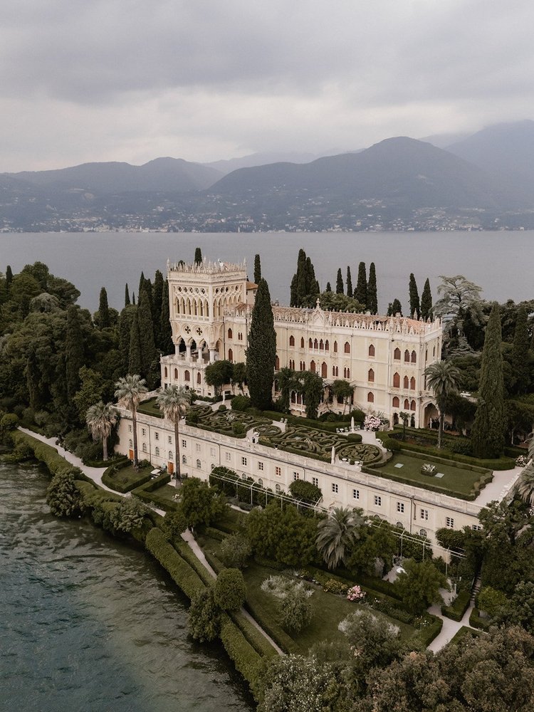 Aerial view of Isola del Garda, its villa and gardens on the lake
