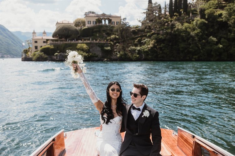 Celebrating with the bouquet on the boat